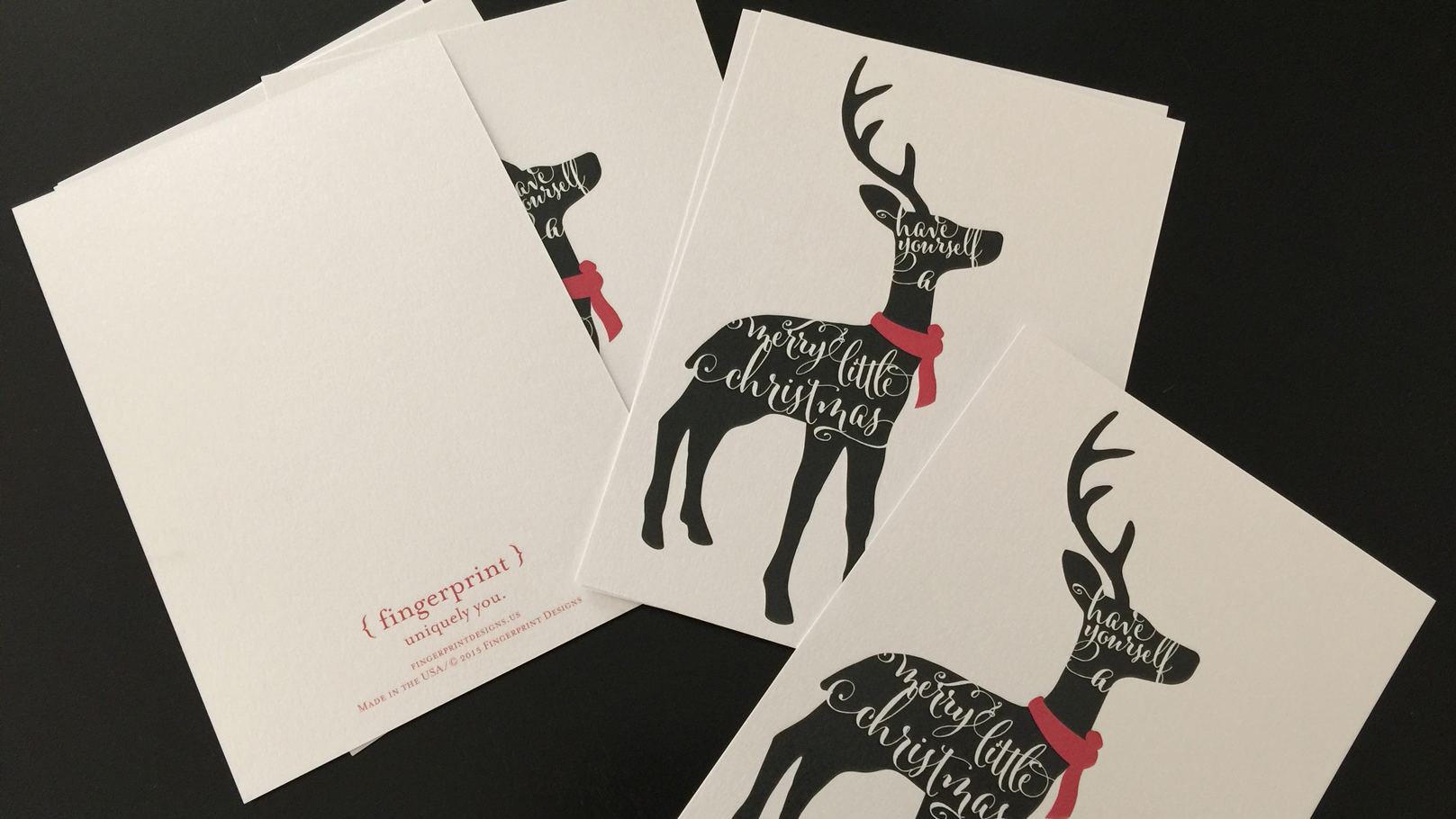 fingerprint design's photo of collateral materials – closeup of Christmas cards