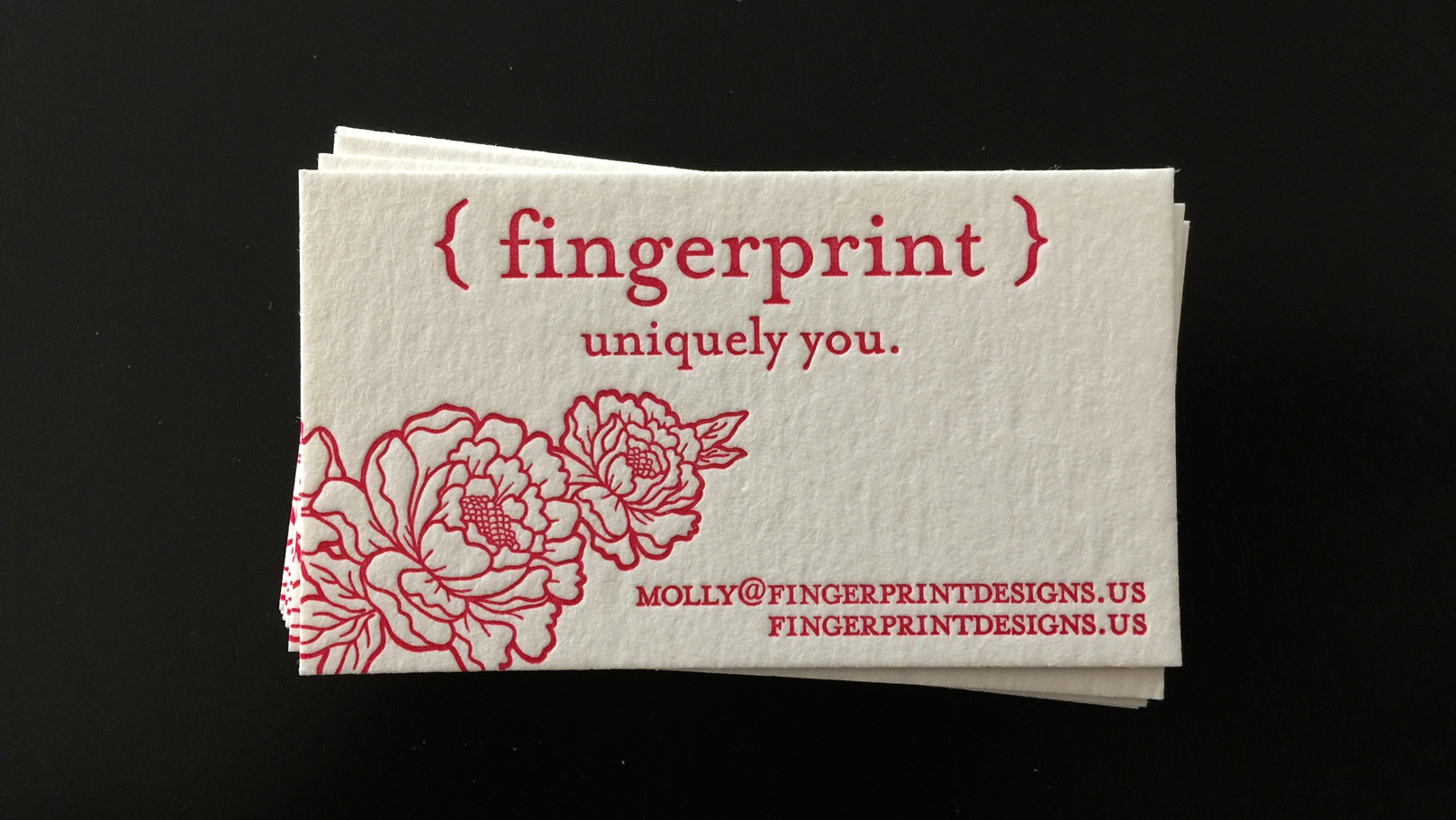 fingerprint design's photo of collateral materials – closeup of letterpress business cards