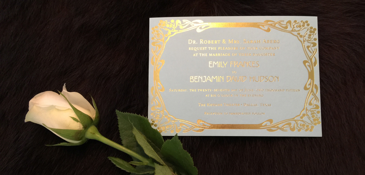 fingerprint design's photo of Emily's gold foil invitation suite, a detail of the invitation