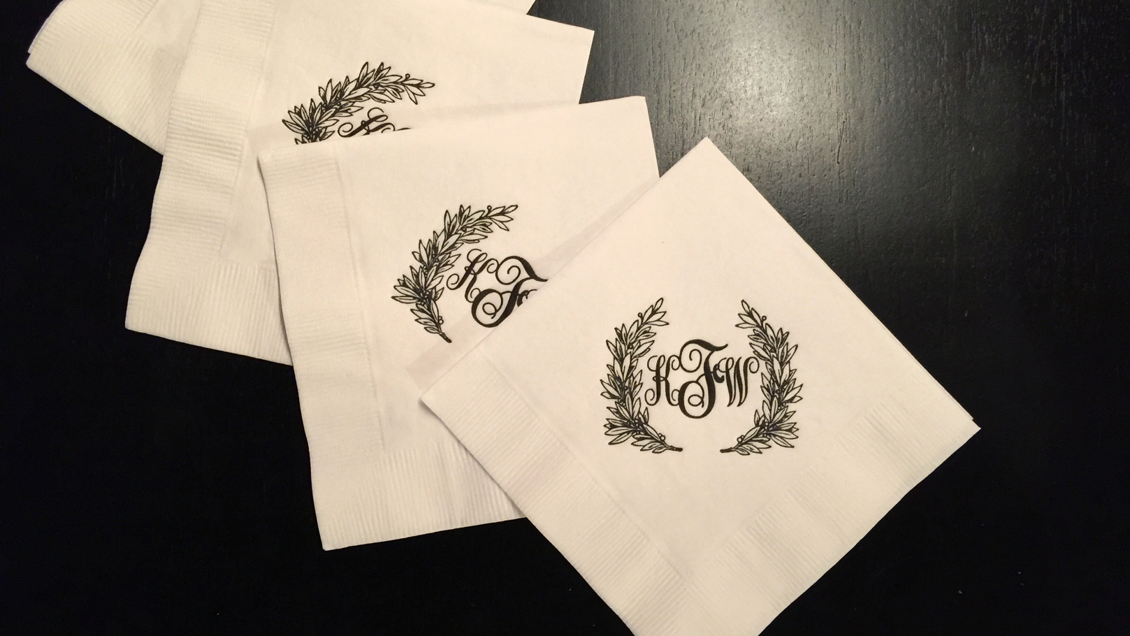 fingerprint design's closeup photo of Katie's custom illustrated wedding napkins