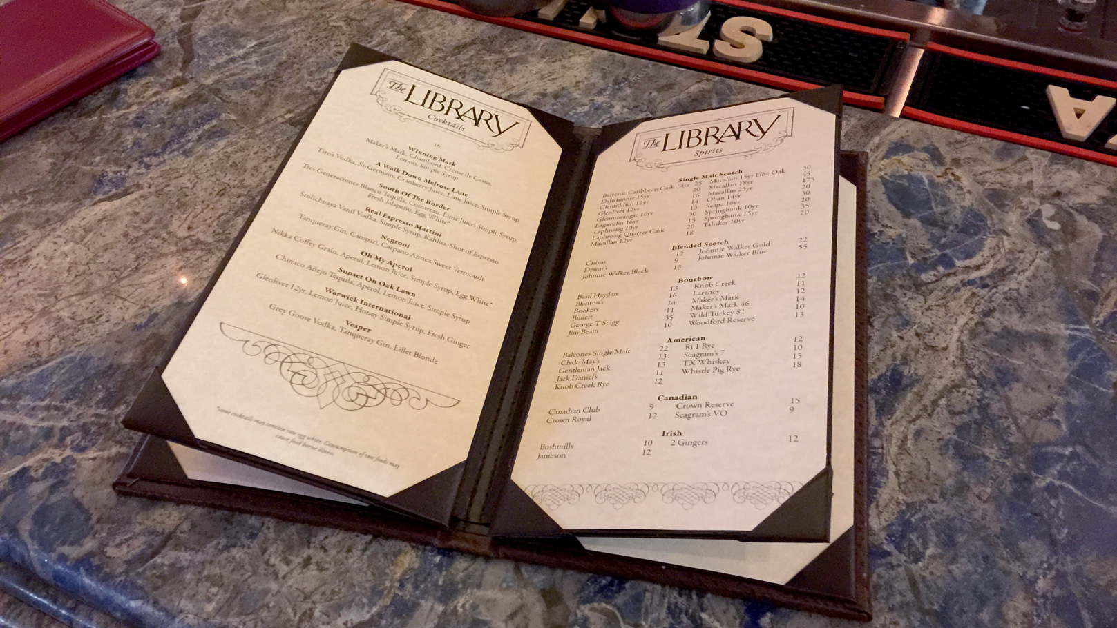 fingerprint design's photo of the Warwick's Library menu open on the bar